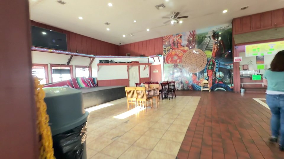 Counter service with Mexican dishes on display.